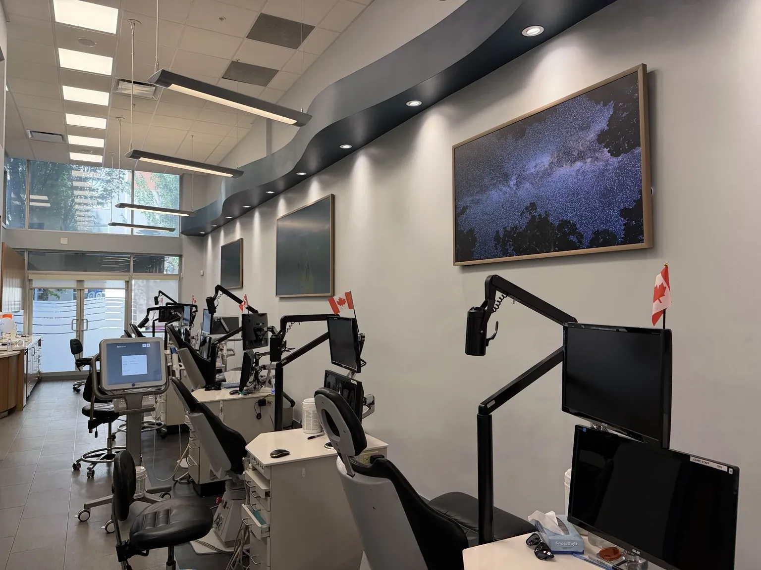 Interior of the myORTHODONTIST Coquitlam treatment area with orthodontic chairs and equipment.